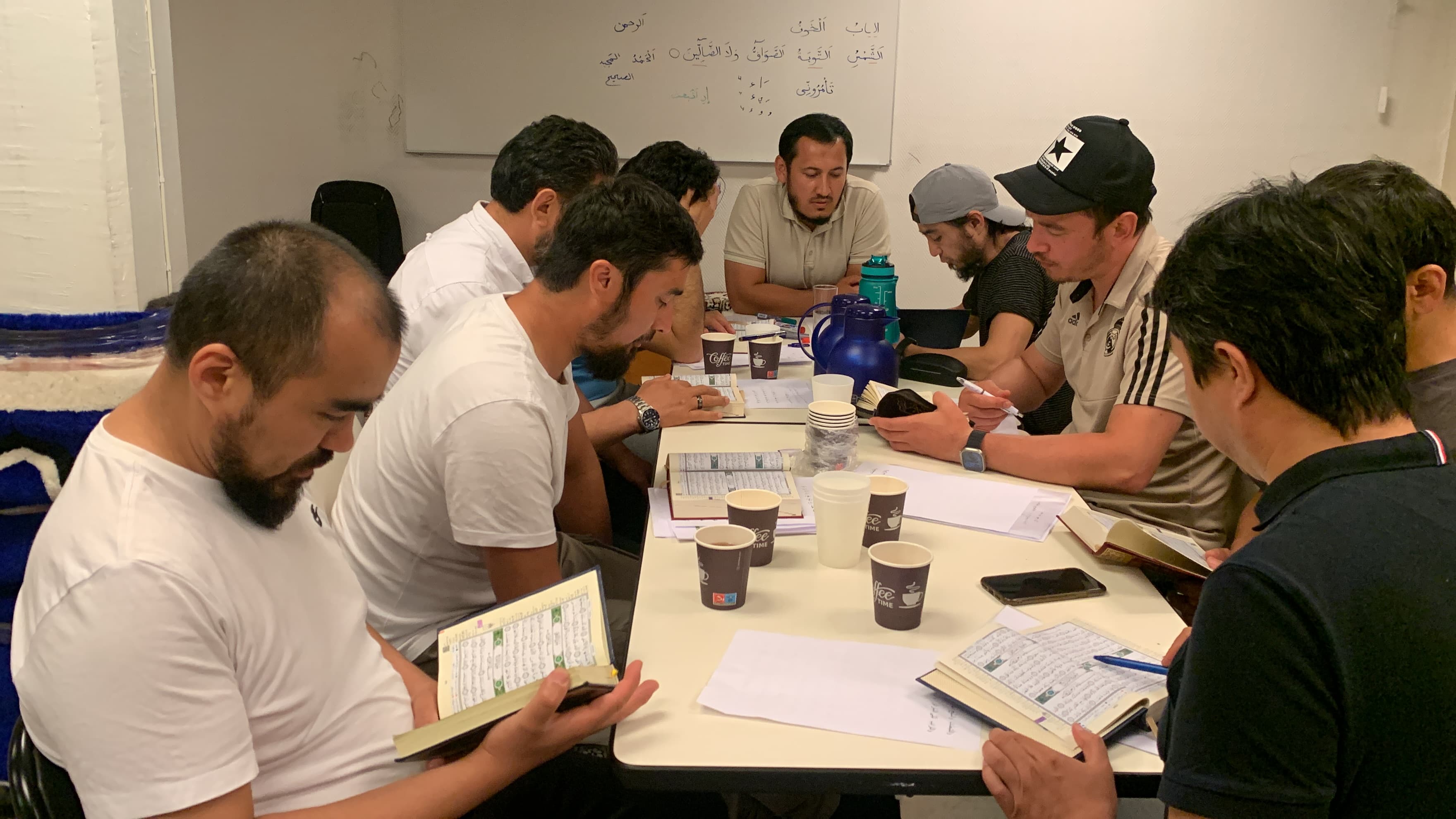Quran study circle with community members
